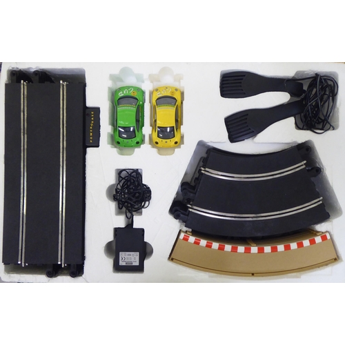 123 - Scalextric collectables  comprising cars, controller and track (completeness not guaranteed) ... 