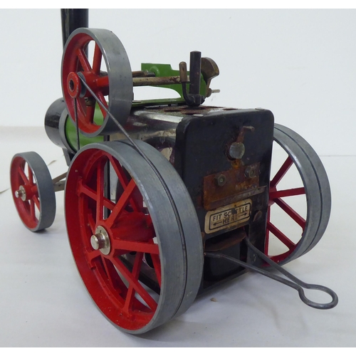 128 - A Mamod diecast live steam model tractor  9