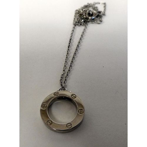 133 - A silver coloured metal designer style pendant, on a fine neckchain  stamped 925