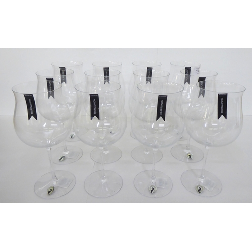 134 - A set of twelve Waterford crystal Burgundy pattern pedestal wine glasses