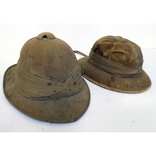 15 - A selection of formal and other hats/helmets: to include two tan coloured pith helmets