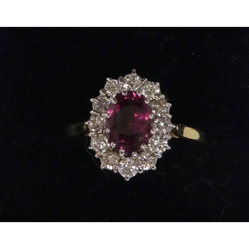 160 - A 14ct gold spinel and diamond set cluster ring