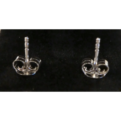 166 - A pair of 18ct white gold, sapphire and diamond set earrings 