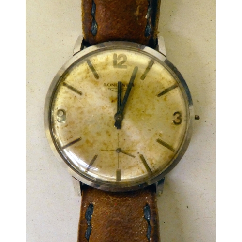 168 - A 1960s/70s Longines stainless cased wristwatch, faced by an Arabic and baton dial with subsidiary s... 