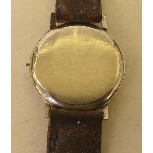 168 - A 1960s/70s Longines stainless cased wristwatch, faced by an Arabic and baton dial with subsidiary s... 