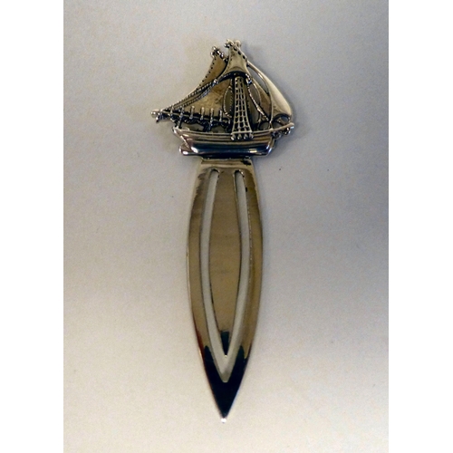 169 - A Sterling silver page marker with a ship under sail terminal 