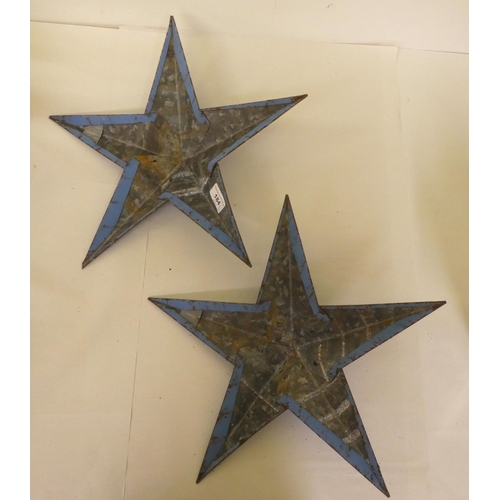 184 - A pair of overpainted, galvanised metal Amish barn stars  15