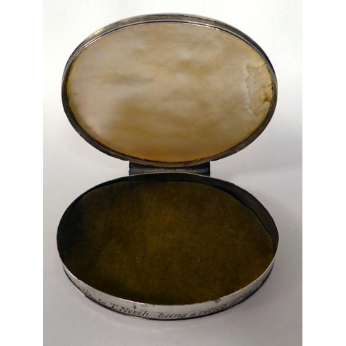 2 - A silver coloured metal oval patch box, set with an engraved mother-of-pearl tablet and around the r... 