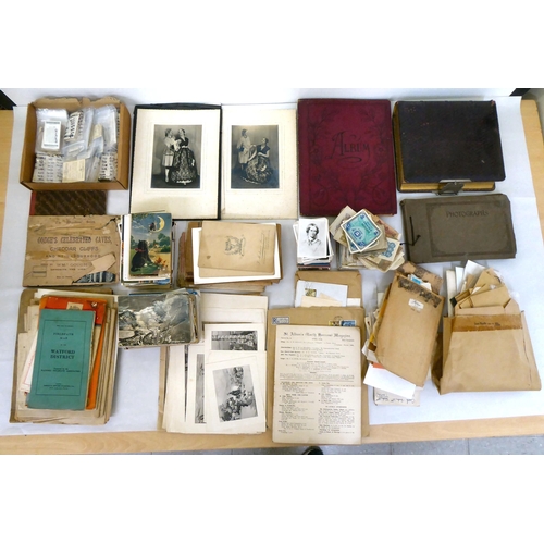 25 - Uncollated used postage stamps; banknotes; cigarette cards; postcards; and handwritten ephemera