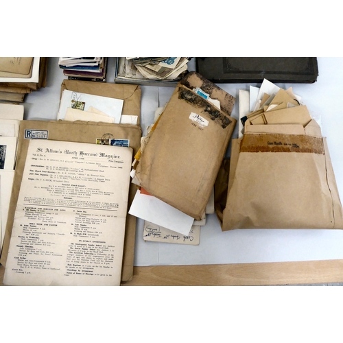 25 - Uncollated used postage stamps; banknotes; cigarette cards; postcards; and handwritten ephemera