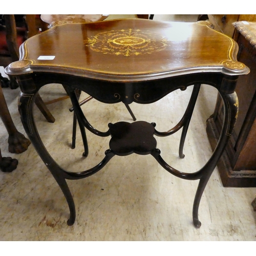 306 - An Edwardian string marquetry inlaid, mahogany hall table, raised on cabriole legs  28