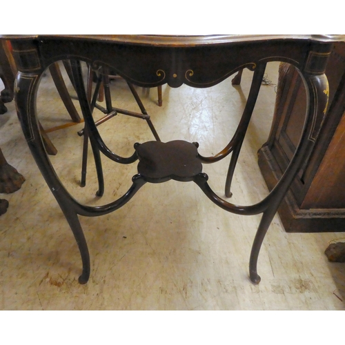 306 - An Edwardian string marquetry inlaid, mahogany hall table, raised on cabriole legs  28