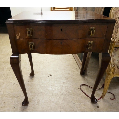 318 - A mid 20thC quarter veneered walnut two drawer canteen table (empty), raised on cabriole forelegs  3... 