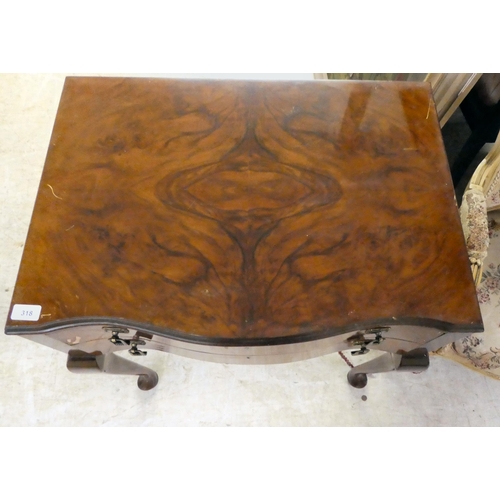 318 - A mid 20thC quarter veneered walnut two drawer canteen table (empty), raised on cabriole forelegs  3... 