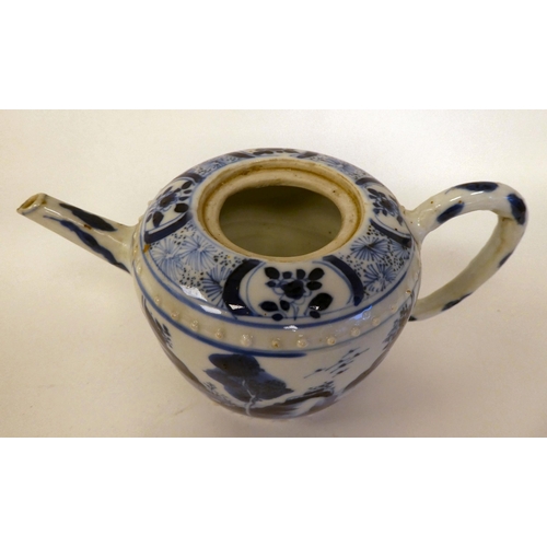 323 - 19thC and later Oriental ceramics: to include a Chinese porcelain charger, decorated in blue and whi... 