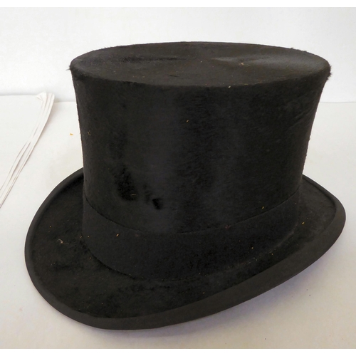 355 - An Alberts of London black silk top hat 