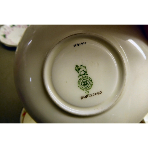 37 - Bone china teaware: to include two dissimilar patterns by Royal Doulton