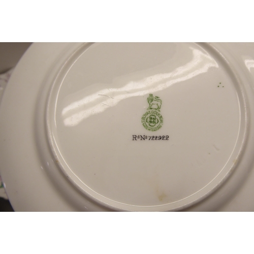 37 - Bone china teaware: to include two dissimilar patterns by Royal Doulton