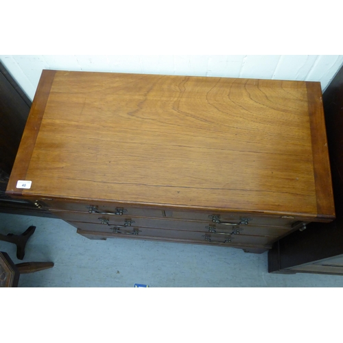 40 - A modern Georgian design mahogany bachelor's chest with a foldover top and two short/two long drawer... 