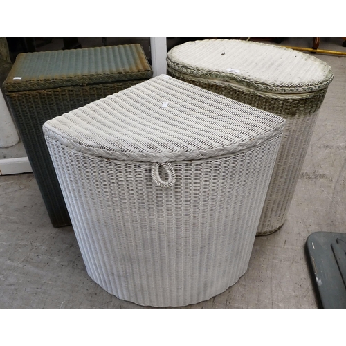 47 - Lloyd Loom furniture: to include a kidney shaped, white painted linen bin with a hinged lid  20