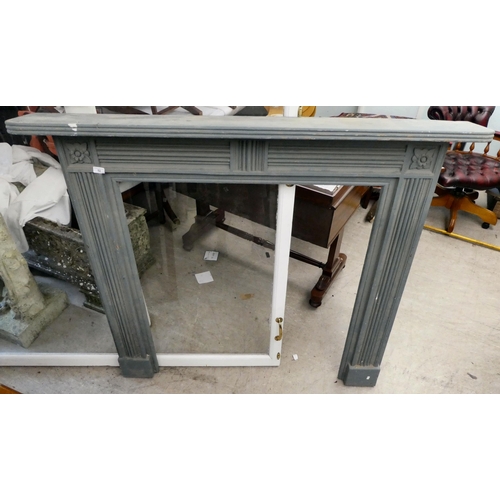 52 - A modern blue painted wooden fire surround  49