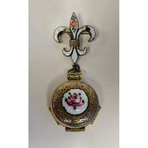 7 - An engraved and enamelled bi-coloured metal fob locket, on a pin brooch opening on four miniature ph... 