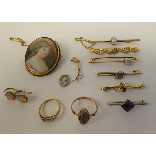 72 - Gold coloured metal items of personal ornament: to include a 15ct pin brooch, set with an opal ... 