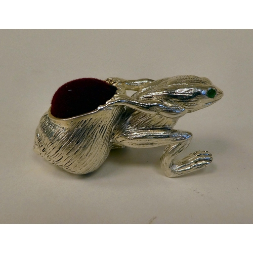 8 - A silver plated novelty pin cushion, a frog with a snail in tow 