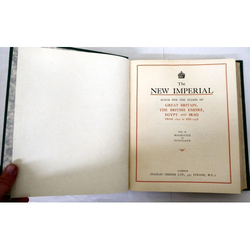 83 - Two 'New Imperial Postage Stamp Albums' published by Stanley Gibbons, containing a small collection ... 