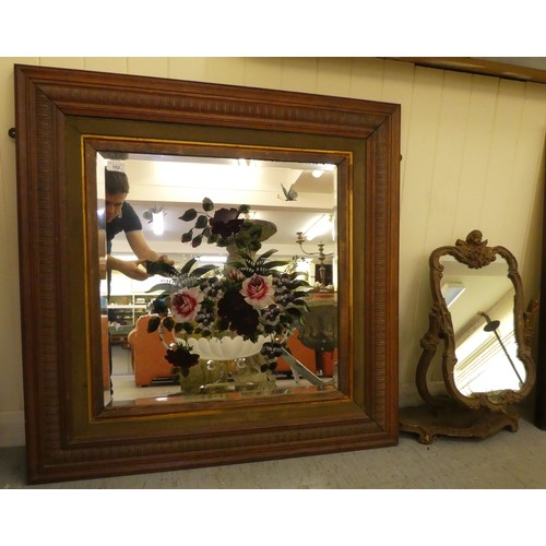 102 - A mixed lot: to include a 1930s dressing table mirror, set in an elaborately moulded gilt frame, piv... 