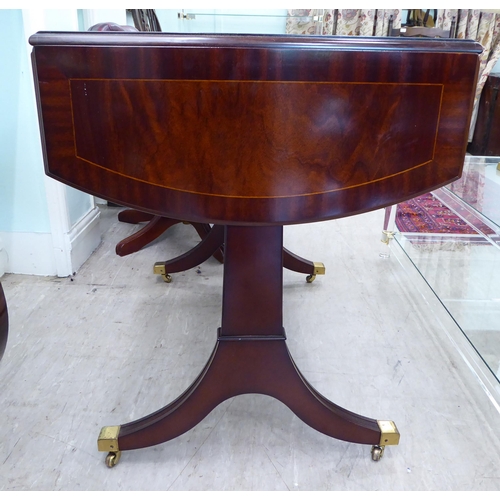 100 - A Re-Furn Heldense Regency style, mahogany finished sofa table with crossbanded and string inlaid or... 