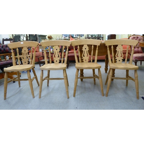 123 - A set of four modern, unpainted beech framed kitchen chairs with solid seats; a contemporary pine br... 