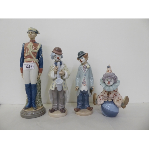 139 - Three Lladro porcelain clown figures  all approx. 9