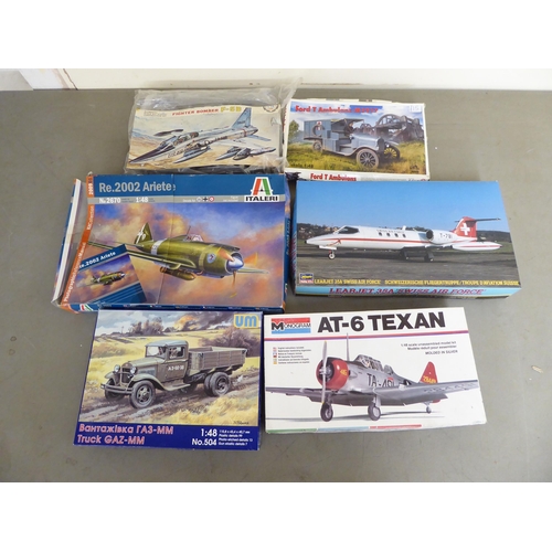 141 - 1/48 scale model kits: to include by Revell, a 223 Flamingo; and a German Heavy Tractor SS-100 by Ta... 