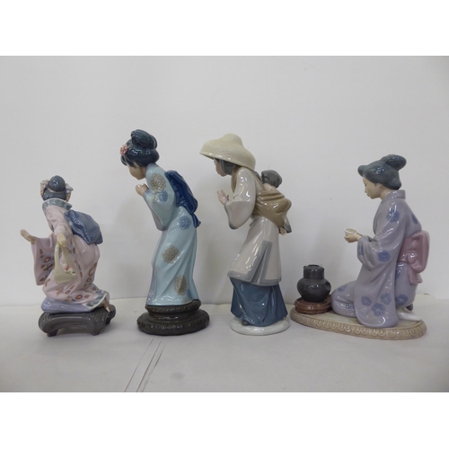 143 - Four Lladro porcelain Oriental themed figures  all approx. 10