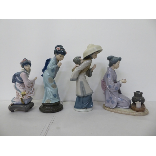 143 - Four Lladro porcelain Oriental themed figures  all approx. 10