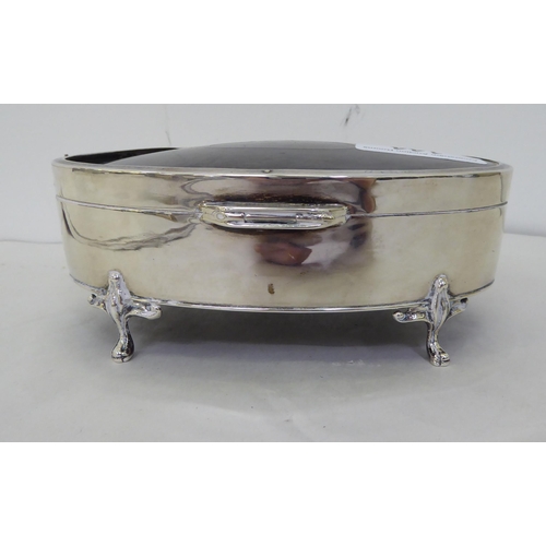 144 - A silver ring box of oval form with a tortoiseshell panel in the hinged lid  Birmingham 1912&nb... 