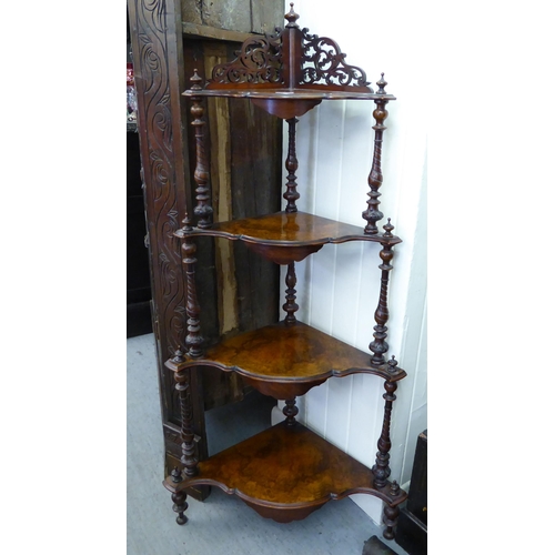 149 - A late Victorian burr walnut and mahogany, four tier corner what-not, raised on turned feet  55... 