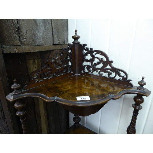 149 - A late Victorian burr walnut and mahogany, four tier corner what-not, raised on turned feet  55... 