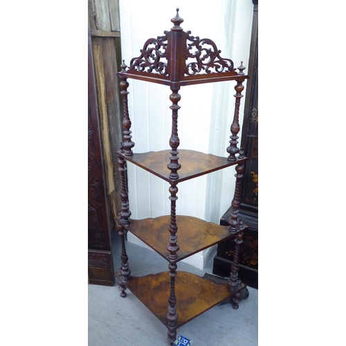 149 - A late Victorian burr walnut and mahogany, four tier corner what-not, raised on turned feet  55... 