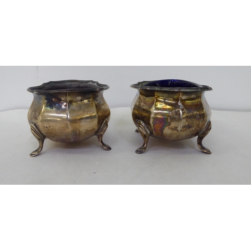 159 - A silver ashtray; and a pair of silver salts  mixed marks