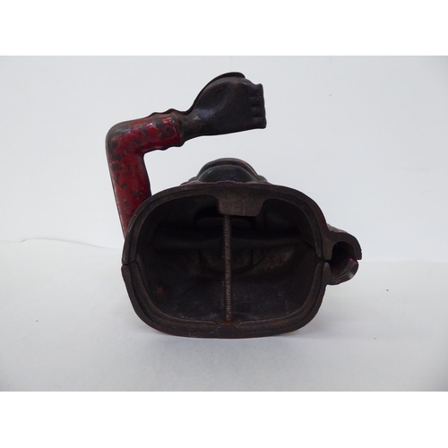 163 - An overpainted cast iron articulated money box  6