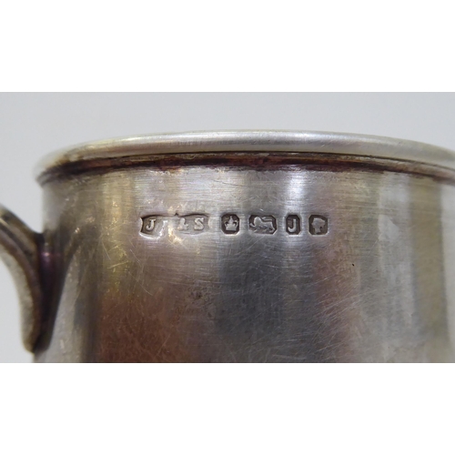 164 - Silver collectables: to include flatware; a mug; a cigarette case; and a spoon and pusher  mixe... 