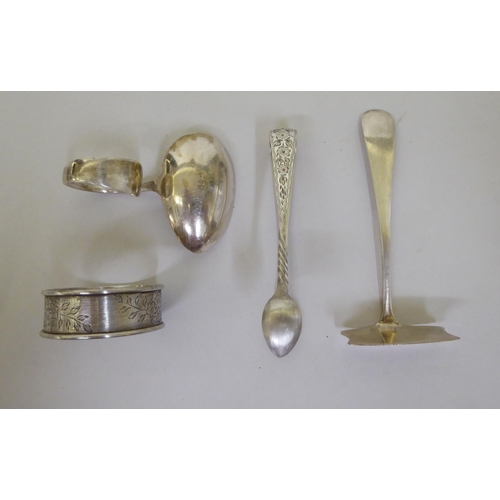 164 - Silver collectables: to include flatware; a mug; a cigarette case; and a spoon and pusher  mixe... 