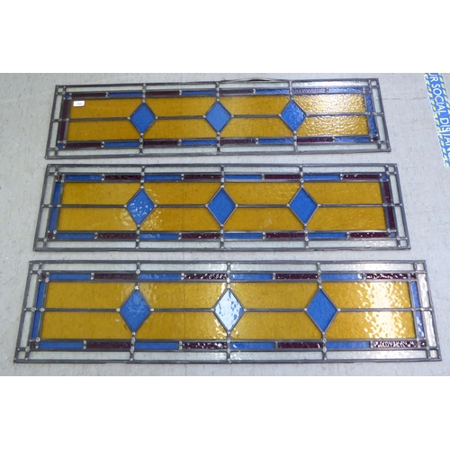 165 - A set of three Arts & Crafts inspired lead coloured glazed panels  12