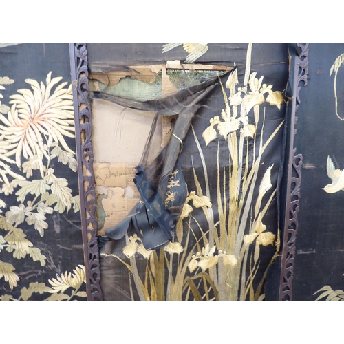 178 - An early 20thC fruitwood framed fourfold room screen with embroidered panels  each panel 66