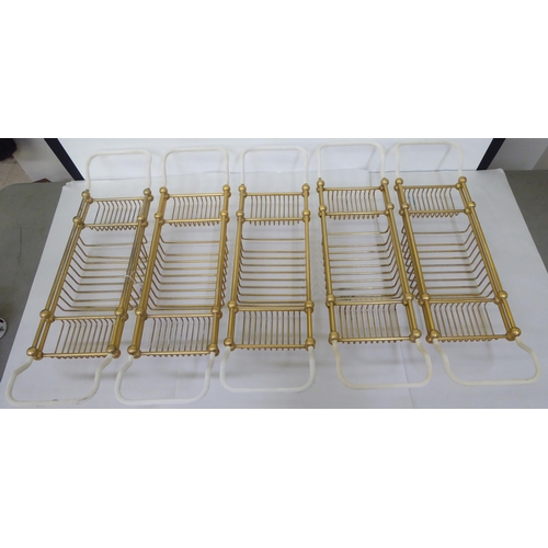 184 - Five tubular lacquered brass bath racks  27