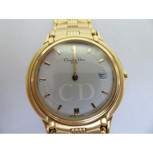 187 - A Christian Dior gold plated Quartz bracelet watch, faced by a baton dial