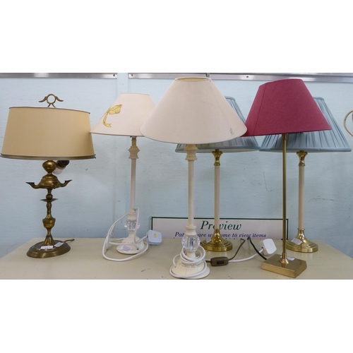 23 - Table lamps: to include a pair of white metal examples  17