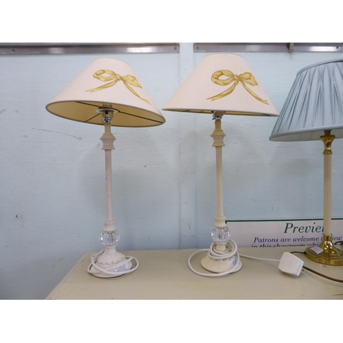 23 - Table lamps: to include a pair of white metal examples  17